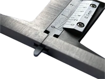 Analoger Messschieber für Profiltiefen am Reifen.